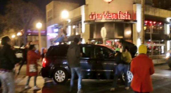People Block Street, Jump on Vehicle, Man Pulls Gun To Get Free People Block Street, Jump on Vehicle, Man Pulls Gun To Get Free