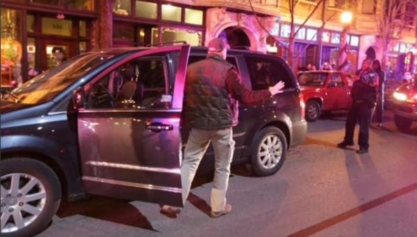 Driver peacefully surrendering to police. Driver peacefully surrendering to police.