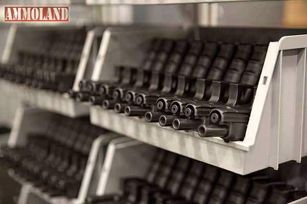 Bins of GLOCK receivers and barrels awaiting final assembly and testing.