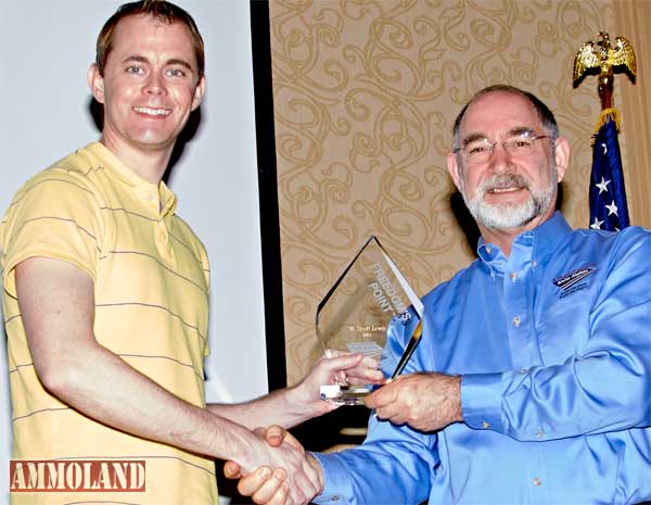 Knife Rights Chairman Doug Ritter presenting Mr. Lewis his award at the Sharper Future Breakfast