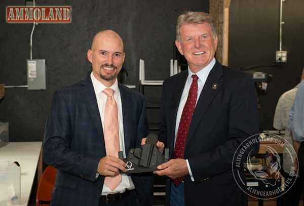 Idaho Governor Butch Otter Shakes Hands with Alien During Alien Gear Holsters Tour