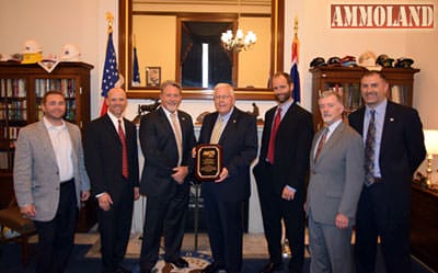 AKTI Board Members in Senator Enzi's office presenting “Common Sense” Award. Morgan Taylor (Taylor Brands), Bill Raczkowski (Gerber), CJ Buck (Buck Knives), Senator Enzi, David Fee (Benchmade), Dan Lawson (Microtech) and Mark Schreiber (CRKT).