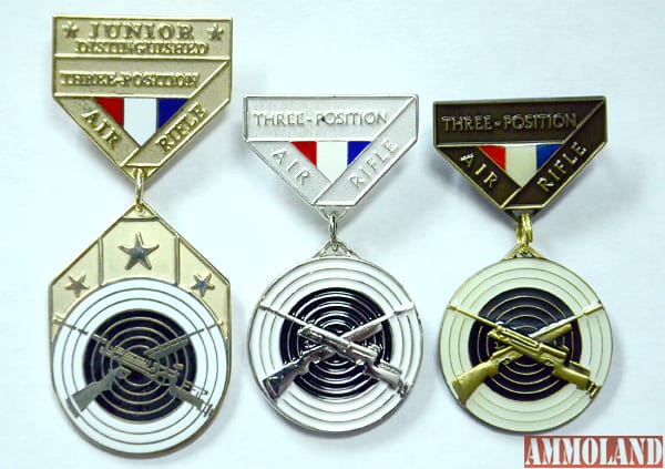 CMP awards bronze and silver EIC badges along with the gold Junior Air Rifle Distinguished Badge.