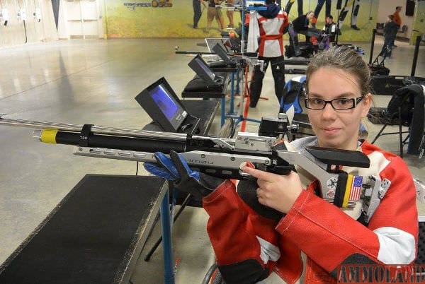 At first, without a jacket of her own, Taylor borrowed Greg's for practice. Unfortunately, Greg's jacket is designed for a right-handed shooter and Taylor is left-handed – not exactly as stabilizing at it should have been. Eventually, Taylor got a jacket of her own.