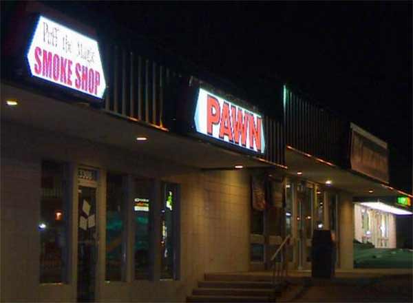 Pawn Store Clerk Shoots At Robbers & Misses