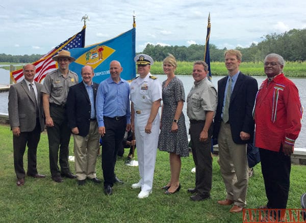 Pictured, left to right: Jeff Downing, Mt. Cuba Center; Chuck Hunt, superintendent, NPS Chesapeake Bay Office; U.S. Senator Chris Coons (D-DE); Governor Jack Markell; Capt. Scott Starkey, Naval Air Station Patuxent River commanding officer; Kristin Thomasgard-Spence, REPI program director; DNREC Secretary David Small; Joel Dunn, Chesapeake Conservancy president and CEO; Chief Dennis Coker, Lenape Tribe. DNREC photo by Jennifer Fitzsimmons.