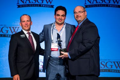 Pete Brownell; NASGW Chairman (left) and Brad Burney; NASGW Vice Chair (right) presenting to Leon Brener, President of TxAT