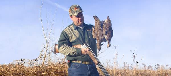 Hunter with bird. 