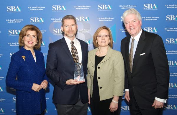 Parabon receives the Tibbetts Award.  (Left to right) Maria Contreras-Sweet, Administrator of the U.S. SBA, Dr. Steven Armentrout, CEO, and Paula Armentrout, VP Operations (Parabon), Mark Walsh, Assoc. Administrator (SBA).