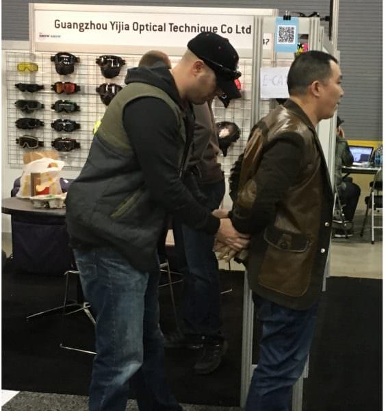 Jiajun Chen and Ping Zhang, owner and sales manager, respectively, of “PTide” (exhibiting as “Guangzhou Yijia Optical Technique Co. Ltd”), were arrested on the trade show floor at this week's SIA Snow Show in Denver, Colorado.