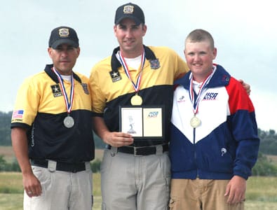 COLORADO SPRINGS, Co.--Staff Sgt. Josh Richmond (center), U.S. Army Marksmanship Unit, won the gold medal in double trap at the U.S. National Shotgun Championships July 13. He is flanked by teammate Spc. Jeff Holguin (left), the silver medalist, and bronze medalist Billy Crawford. All three shooters were tied after the final round and competed in a three-way shoot-off to determine the winner. (Photo by Michael Molinaro, USAMU PAO)