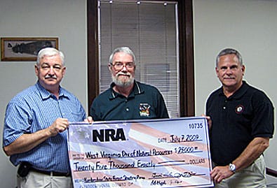 WV Range Grant Check Pres 2009.jpg: NRA awarded $25,000 for a new range at West Virginia’s Kumbrabow State Forest. (l. to r. NRA’s John Joines; Curtis Taylor, Chief of the Wildlife Resources Section of the West Virginia DNR; and Brian Hyder, NRA Eastern Regional Director)