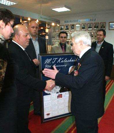 The team from Arsenal, Mr. Kalashnikov and the giant card from the firearms industry.