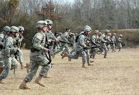 FORT BENNING, Ga.--Soldiers run to the next firing position during a match at the 2009 U.S. Army Small Arms Championships. The 'All-Army' is designed to test the entire depth of a Soldier's shooting ability. The 2010 Championships, hosted by the U.S. Army Marksmanship Unit, will be held Feb. 20-27 at Fort Benning for all Soldiers, Cadets, Reservists and National Guardsmen. (Photo courtesy of USAMU)