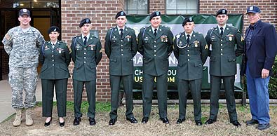 FORT BENNING, Ga. -- Lt. Col. Daniel Hodne (left), commander, U.S. Army Marksmanship Unit, and Col. (RET) Robert I. Hoidahl, Jr., president, Military Marksmanship Association, pose with the nominees for the 2009 MMA Soldier of the Year. From left to right the nominees were: Spc. Sherri Gallagher; Sgt. Daniel Horner; Spc. James Travillion; Sgt. 1st Class James Henderson; Sgt. Vincent Hancock; and Sgt. Michael McPhail. Sgt. 1st Class Daryl Szarenski is not pictured. (Photo by Michael Molinaro, USAMU PAO)