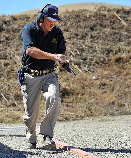 Jerry Miculek reloading on the run.