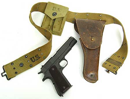 Colt model 1911 A1 .45 automatic pistol,1943, with WWII holster and belt (est. $1,000-$2,000).