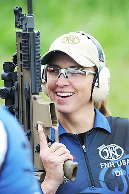 Dianna Liedorff, a 17-year veteran of the Tulsa Police Department and FNH USA Shooting Team member, prepares to shoot the SCAR 16S.