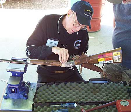 John Cowell works on a firing pin