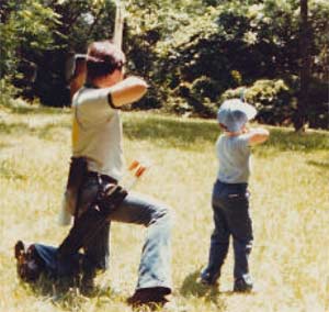 bowhunting father and son