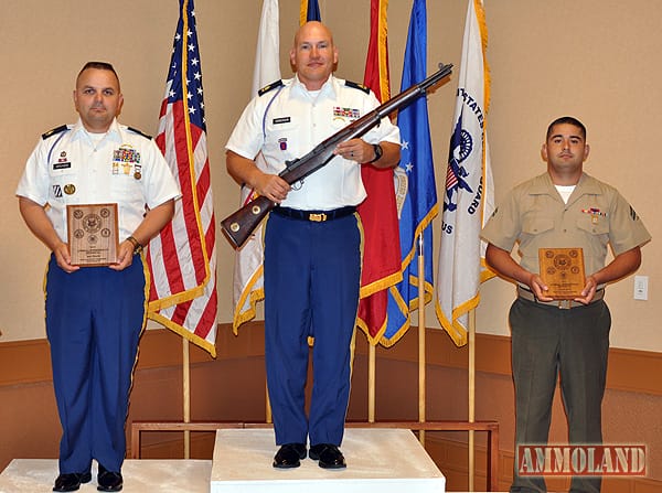 FORT BENNING, Ga. -- Sgt. 1st Class James Henderson (middle), U.S. Army Marksmanship Unit, won the individual championship at the 52nd Interservice Pistol Championship. Staff Sgt. Lyman Grover (left), USAMU, placed second and Marine Cpl. Luis Esparza (right) came in third. (Photo by Michael Molinaro, USAMU PAO)