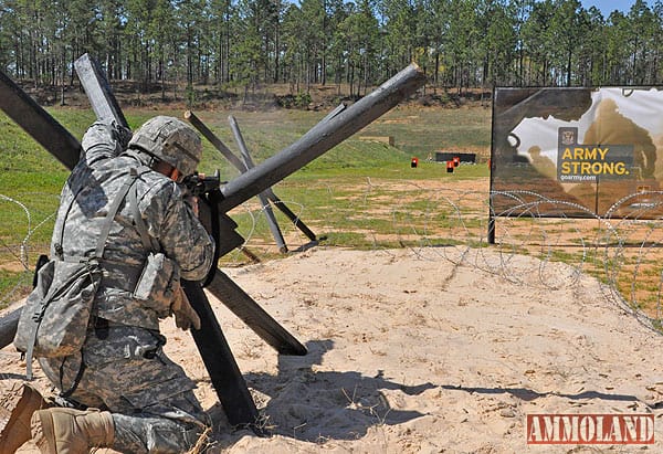 Soldier dodges obstacles while shooting