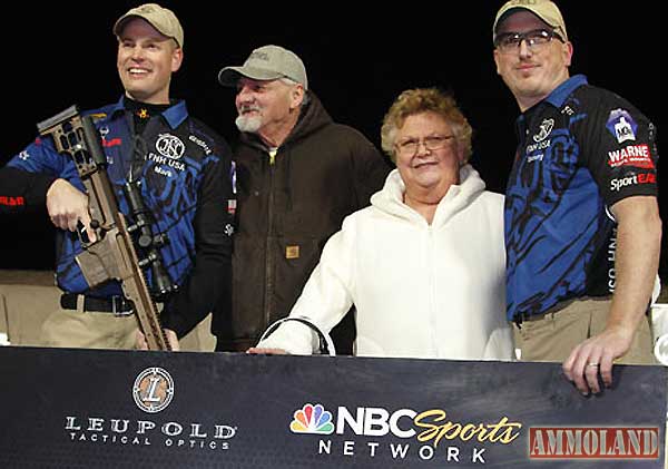 Team FNH USA's Tommy Thacker with his parents (center) and runner-up Mark Hanish (left). Photo by Patrick Kelley www.multigunmedia.com