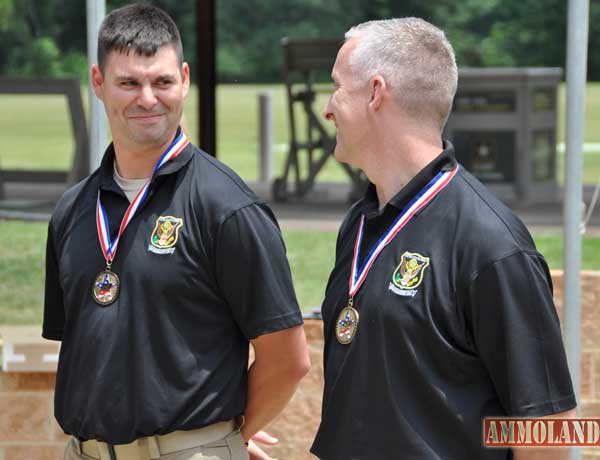 Staff Sgt. Michael McPhail (Left) and Sgt. 1st Class Eric Uptagrafft