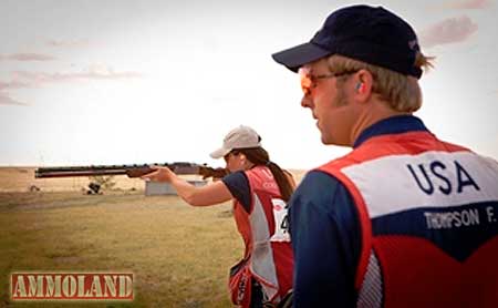 Frank Thompson watches Olympic bronze medalist Corey Cogdell.