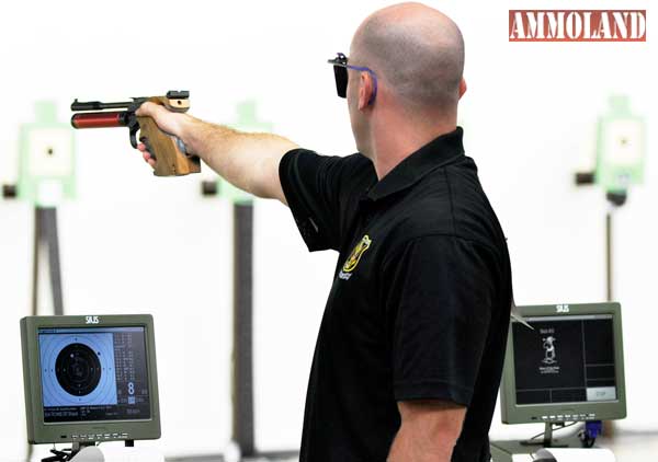 FORT BENNING, Ga. - Staff Sgt. Shaun Tichenor, U.S. Army Marksmanship Unit, competes recently at the USA Shooting National Rifle and Pistol Championships at the unit's Pool Indoor Range. Tichenor, along with Sgt. Eric Trueblood, was named to the U.S. Paralympic Developmental Team while Sgt. John Joss was named to the national team. All three Soldiers are members of the USAMU's new Paralympic section, made up of wounded warriors deemed able to continue serving on active-duty (Photo by Michael Molinaro, USAMU)