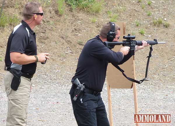 Chris Cerino coaching a shooter for 3 gun