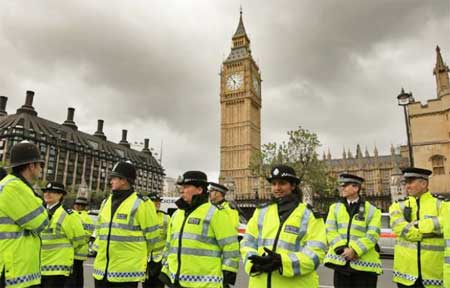 Home Secretary Theresa May has dodged questions on police numbers while Police Minister Nick Herbert has said personnel numbers are not the best measure of success against crime.