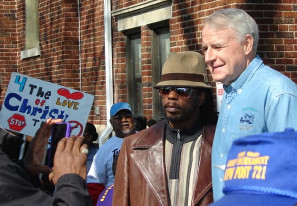 Mayor Barrett poses for pictures before the Cease Fire Walk