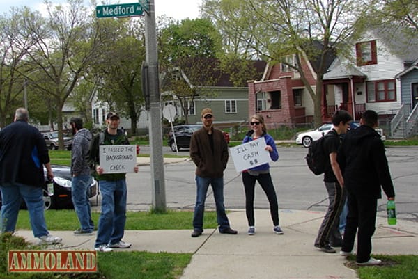 A group of private purchasers at the Milwaukee gun turn in (buy back)