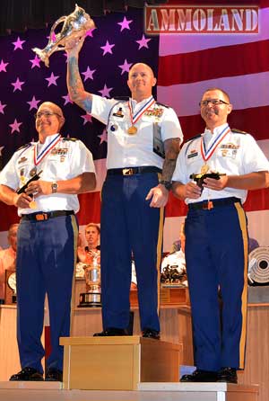 Staff Sgt. Patrick Franks with the National Championship Harrison Trophy