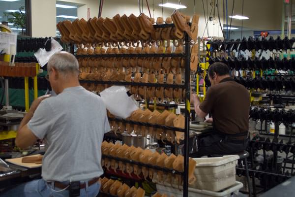 These two gentlemen are hand boning premium holsters.