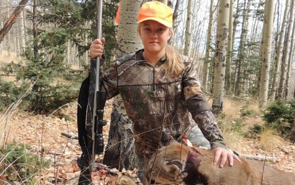 Alyssa Caldwell with TX lion she killed in self defense.