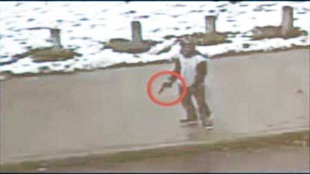 Cleveland boy waving toy gun at police, just before being shot.