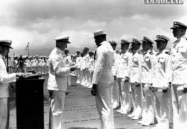 In May 1942, Miller became the first black man to receive the Navy Cross for bravery in the line of fire, which Adm. Chester W. Nimitz, the commander in chief of the Pacific Fleet, personally presented to Miller on board the aircraft carrier USS Enterprise.