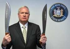 NY Sen. Avella with the two scarcest Machetes he could find.