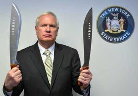 NY Sen. Avella with the two scarcest Machetes he could find.