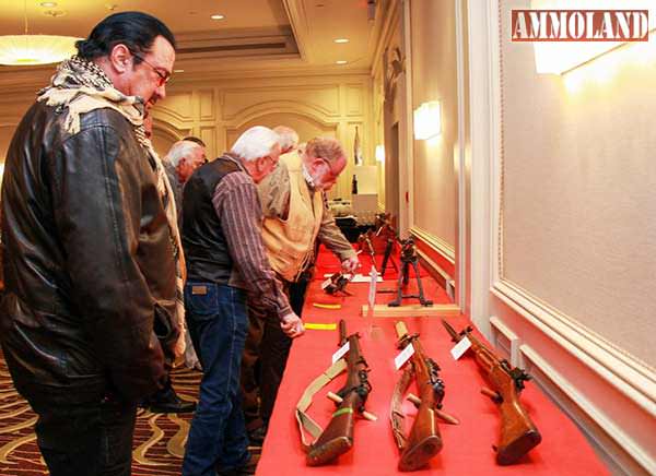 Steven Seagal Looking at Historical Gun Collection