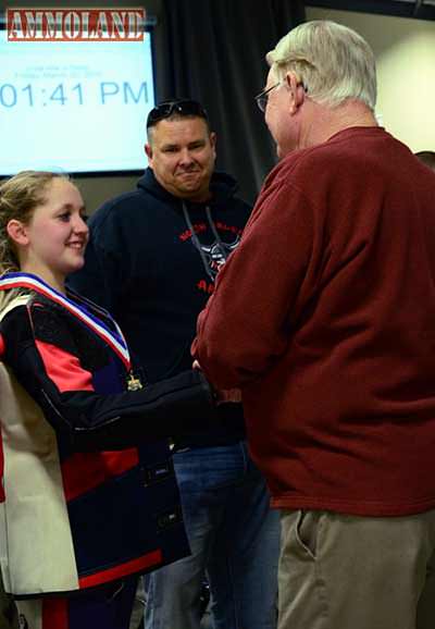 Two-time Olympic Gold Medalist Gary Anderson congratulates Taylor Gibson on her gold medal on Day 1 firing a 690.3. Taylor also set a new Army JROTC national record in kneeling for a score of 200-18X.