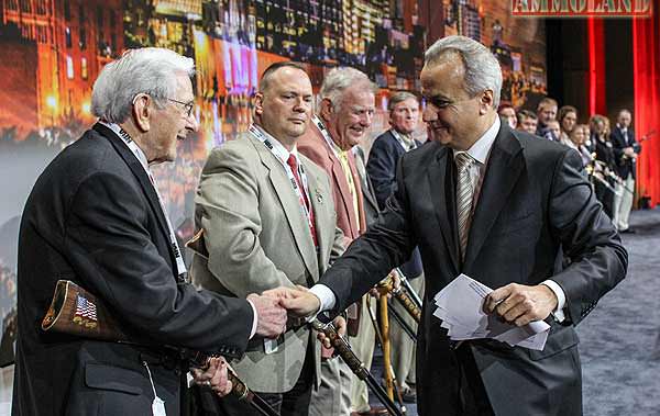 Anthony Imperato, President of Henry Repeating Arms, thanking Edgar Harrell, a U.S. Marine Corp. Veteran and survivor of the sinking of the USS Indianapolis for his service to our country. Imperato presented Henry Tribute Rifles to local heroes including to U.S. Veterans, Active Duty Military Personnel, First Responders and an NRA Instructor at The NRA Foundation Banquet & Auction at The National NRA Foundation at the Music City Center in Nashville, TN as part of The NRA 2015 Annual Meetings & Exhibits. Henry Repeating Arms Honors Veterans, 1st Responders & NRA Instructors