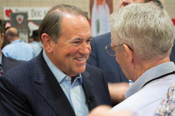 Former Governor Mike Huckabee meeting some voters.
