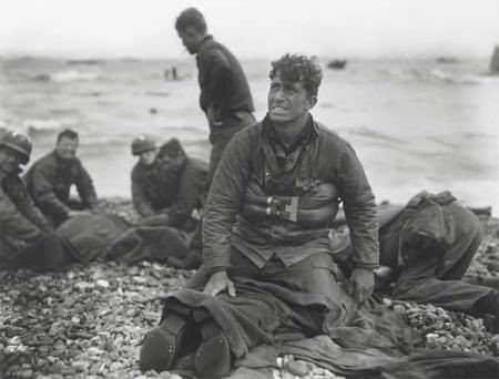 Survivors Help The Wounded on Omaha Beach