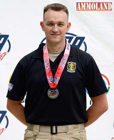 FORT BENNING, GA - Staff Sgt. George Norton poses on the podium after finishing second in 3-Positon Rifle during the 2015 USA Shooting Rifle and Pistol Championship at Fort Benning, Georgia.