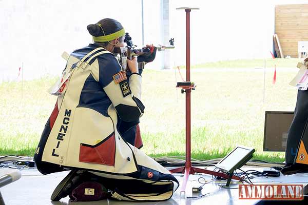 FORT BENNING, GA - Sgt. Erin Mcneil fires from the kneeling during the finals for Women’s 3-Position Rifle during the 2015 USA Shooting Rifle and Pistol National Championship at Fort Benning, Georgia.