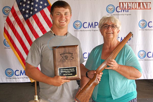 High junior of the Springfield Match was Joseph Albany, 20, of High Point, NC, who fired a score of 282-2x. Mrs. Judy Legerski, Chairman, CMP Board of Directors, presented Joseph with his trophy plaque.