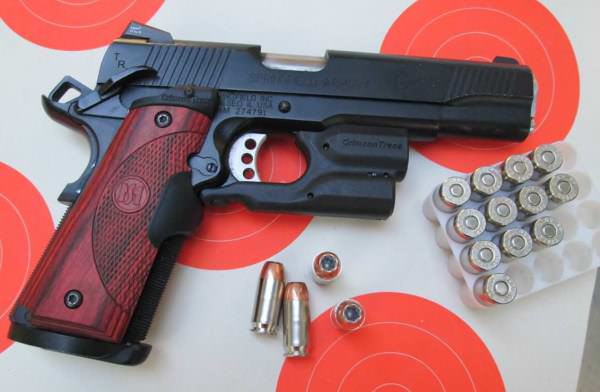 The Crimson Trace Lightguard adds a light to a standard 1911. It's slim like the 1911 too.